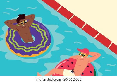 hombres en piscina con anillos inflables relajantes