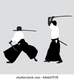 Men silhouettes practicing Aikido