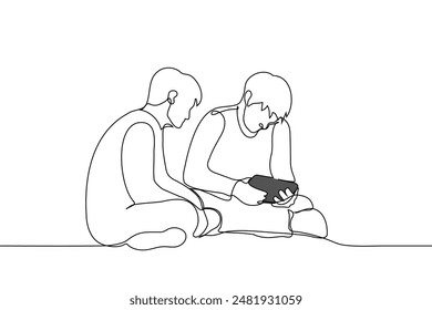 men are sitting on the floor, one of which is holding a tablet in his hands - one line art vector. concept friends, brothers, couple, students. Handmade vector not AI