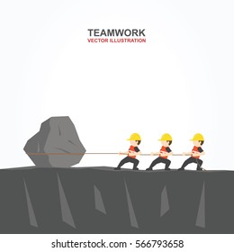 Men and their leader help each other to pull the rock.