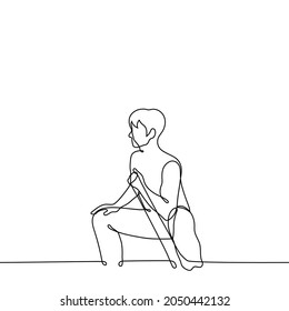 Entrenamiento de hombres con bandas de resistencia - dibujo de una línea. Sentado estirando con bandas de resistencia 