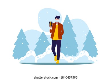 Men in winter clothes with mask, men makes a gift, 
man in a medical mask on the street.