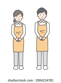 Men and women in aprons.