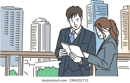 Men and women of businessmen who talk while looking at a notebook
