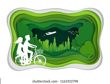 Men and women are cycling in the lawn. paper art carving of and park on green town shape. ecology friendly. vector art and illustration