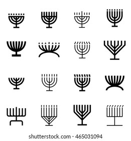Menorah pattern. Flat black icons set.
16 different menorah shapes in one pattern.