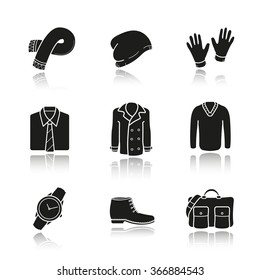 Men's clothes and accessories drop shadow black icons set. Wrist watch, hand bag, classic shirt and gloves. Winter hat, boots and sweater. Autumn coat. Logo concepts. Vector illustrations
