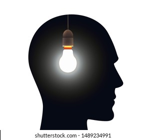 Men's head silhouette with electric bulb lamp on black background inside. Idea concept