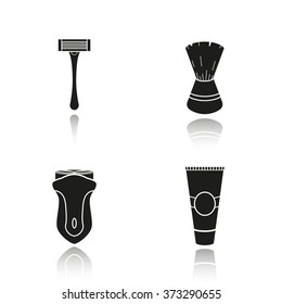 Men's shaving accessories drop shadow icons set. Shaving razor, shaving brush, electric shaver and aftershave cream. Facial hair grooming kit. Barbershop equipment.  Logo concepts. Vector illustration