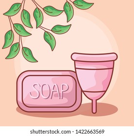 menstrual cup with bar soap and leafs