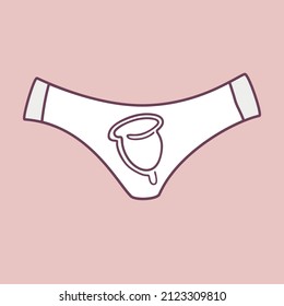 Copa menstrual sobre el fondo de calzoncillos de mujeres blancas. Período de basura cero.
