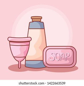 menstrual cup with soap and tube bottle