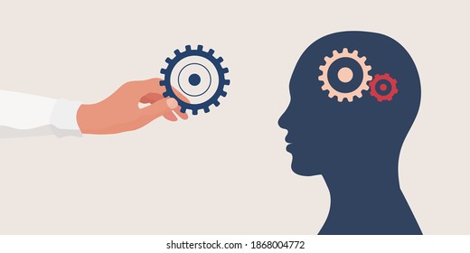 Mental health concept.Therapist or doctor hand holding a gear for as a symbol of mental care.Head with cogs.Psychology and psychiatry. Depression.Stress.Mind.Disease.Psychotherapy.Mood