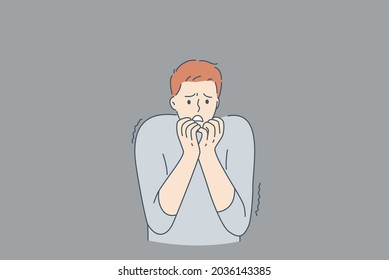 Mental health and inner fears concept. Young stressed man cartoon character standing biting nails feeling bad with ghosts at wall from inside fears vector illustration 