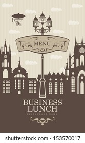menu for business lunches with the old town and a street lamp