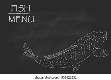 Menu concept. Fish on chalkboard blackboard.