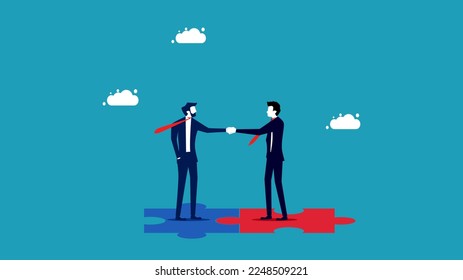 Mergers and Acquisitions. Businessmen shaking hands on jigsaw puzzle