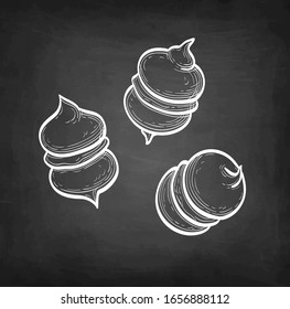 Meringue cookies. Chalk sketch on blackboard background. Hand drawn vector illustration. Retro style.