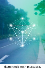 Merkaba sacred geometry spiritual new age futuristic illustration with interlocking circles, triangles and glowing particles in front of blurry natural photographic background