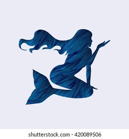 Mermaid designed using blue grunge brush graphic vector.