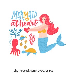 Mermaid at heart - girl t-shirt quote lettering. Calligraphy inspiration graphic design typography element with cute mermard character and sea animals. Hand written postcard. Flat vector illustration.