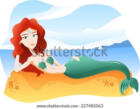 Mermaid lying on a rock at the beach.