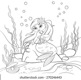 Mermaid sitting the rock