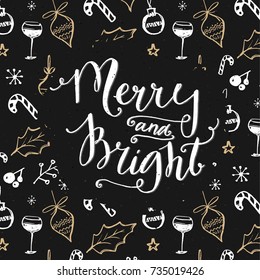 Merry and bright text on Christmas decorations pattern. Dark design with white and gold doodles