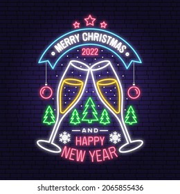 Merry Christmas and 2022 Happy New Year neon sign with glasses of champagne and christmas tree, ball, snowflakes. Vector. Vintage typography design for xmas, new year emblem in retro style.