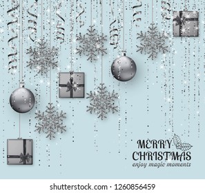 Merry Christmas background with shiny snowflakes, silver balls, gift boxes and grey colored  tinsel and streamer. Greeting card and Xmas template. Vector illustration.