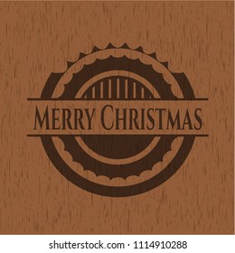 Merry Christmas badge with wooden background