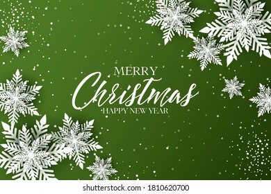 Merry Christmas banner with decorated snowflake paper cut green background emerald