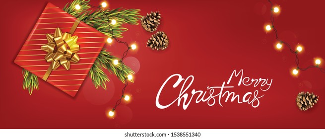 Merry christmas banner with golden ribbon gift box, conifer cones, fir tree leaves and warm fairy lights. Red background vector