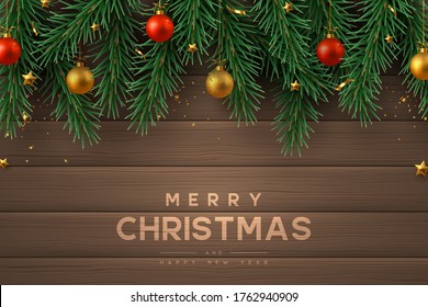 Merry Christmas banner with realistic gold and red ball, pine branches and stars. Wooden background. New Year vector illustration.