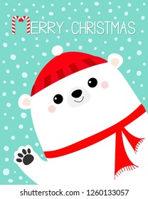 Merry Christmas. Big white polar bear waving hand paw print. Red winter hat, scarf. Happy New Year. Cute cartoon funny kawaii baby character. Greeting Card. Flat design. Blue snow background. Vector