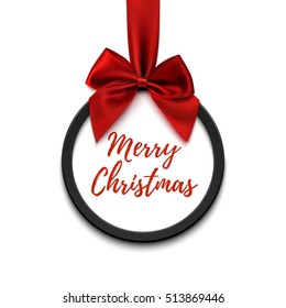 Merry Christmas black round banner with red ribbon and bow, isolated on white background. Brochure or banner template.