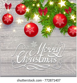 Merry Christmas Calligraphic Lettering on Elegant Soft Wood Textured Background with Golden Lights, Fir Tree Branches and Christmas Toys. Vector illustraion