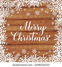 Merry Christmas calligraphy hand lettering on wood background with snowflakes. Winter holidays quote. Vector template for typography poster, banner, greeting card, etc