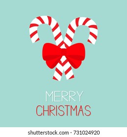 Merry Christmas. Candy Cane two peppermint stick set. Big red bow decoration. Greeting card. Flat design. Blue background. Isolated. Vector illustration