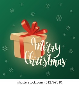 Merry Christmas card. Cardboard box with ribbon and bow. Hand lettered greeting. Green background with snowflakes. Traditional colors.