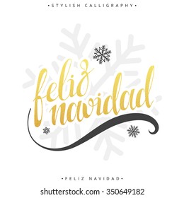 Merry Christmas card with greetings in spanish language. Feliz navidad. Calligraphy for design greeting cards with gold. Congratulations in Spanish. Realistic texture of gold leaf.