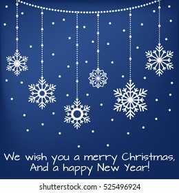 Merry christmas card. Inscription with snowflakes on a blue background.