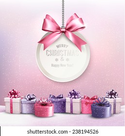 Merry Christmas card with a ribbon and gift boxes.