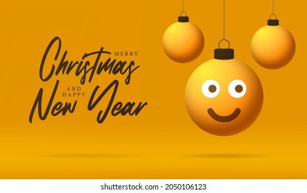 Merry Christmas card with smile emoji face. Vector illustration in flat style with Xmas lettering and emotion in christmas ball hang on thread on background