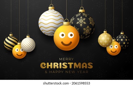Merry Christmas card with smile emoji face. Vector illustration in flat style with Xmas lettering and emotion in christmas ball hang on thread on background