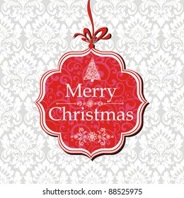 Merry Christmas card. Vector greeting card on a red background with bow