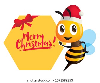 Merry Christmas. Cartoon cute bee pointing to honeycomb signboard with big Merry Christmas lettering greeting - Vector character illustration isolated