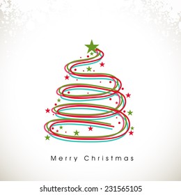 Merry Christmas celebration concept with stylish X-mas tree decorated with stars on shiny snowflake decorated background.