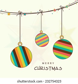 Merry Christmas celebration concept with stylish hanging X-mas ball on stars decorated beige background.