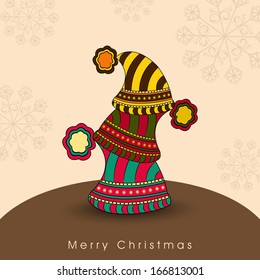 Merry Christmas celebration greeting card or invitation card with stylish tree made by colorful hats on snowflakes decorated background. 